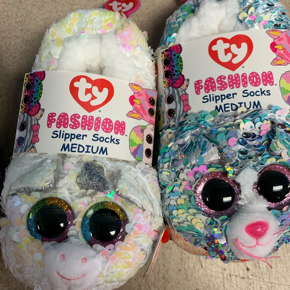 Two pairs Meduim slipper socks.